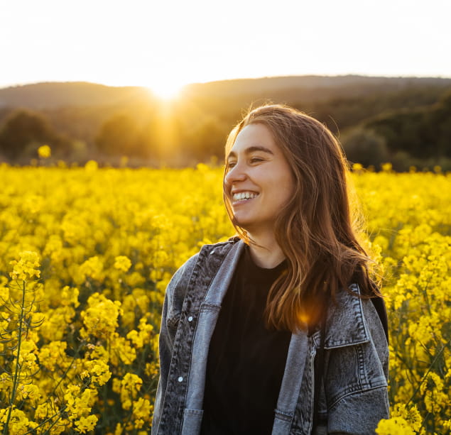 Woman standing in field